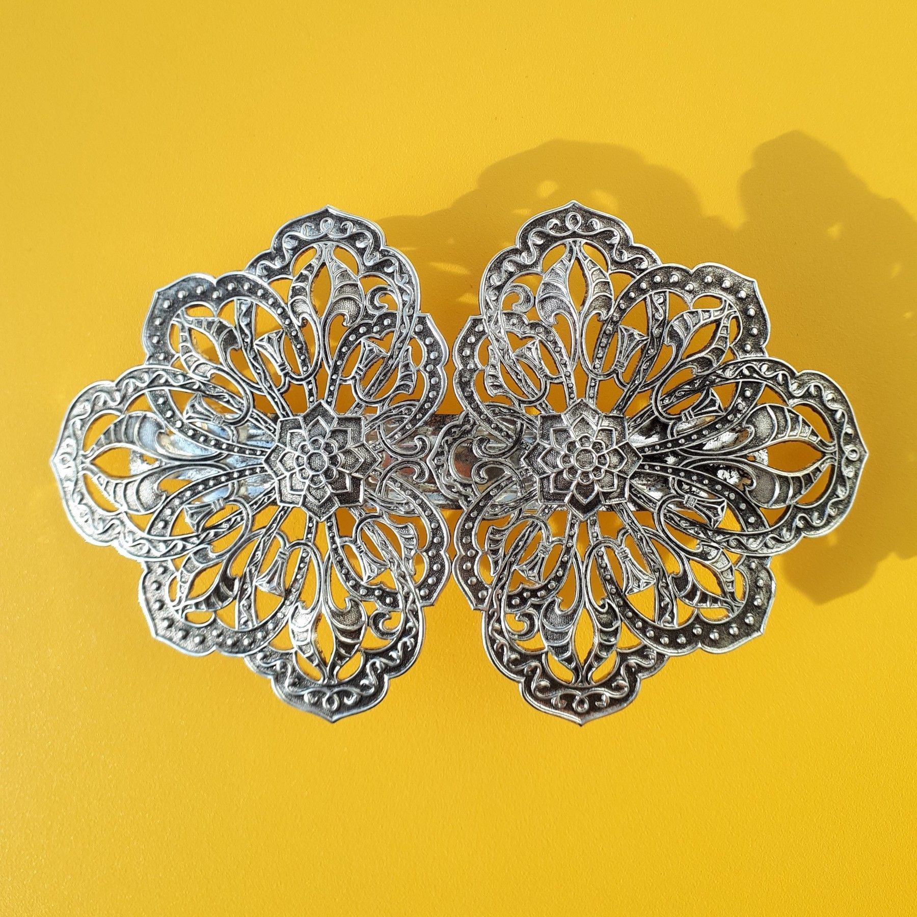 Barrette volute
