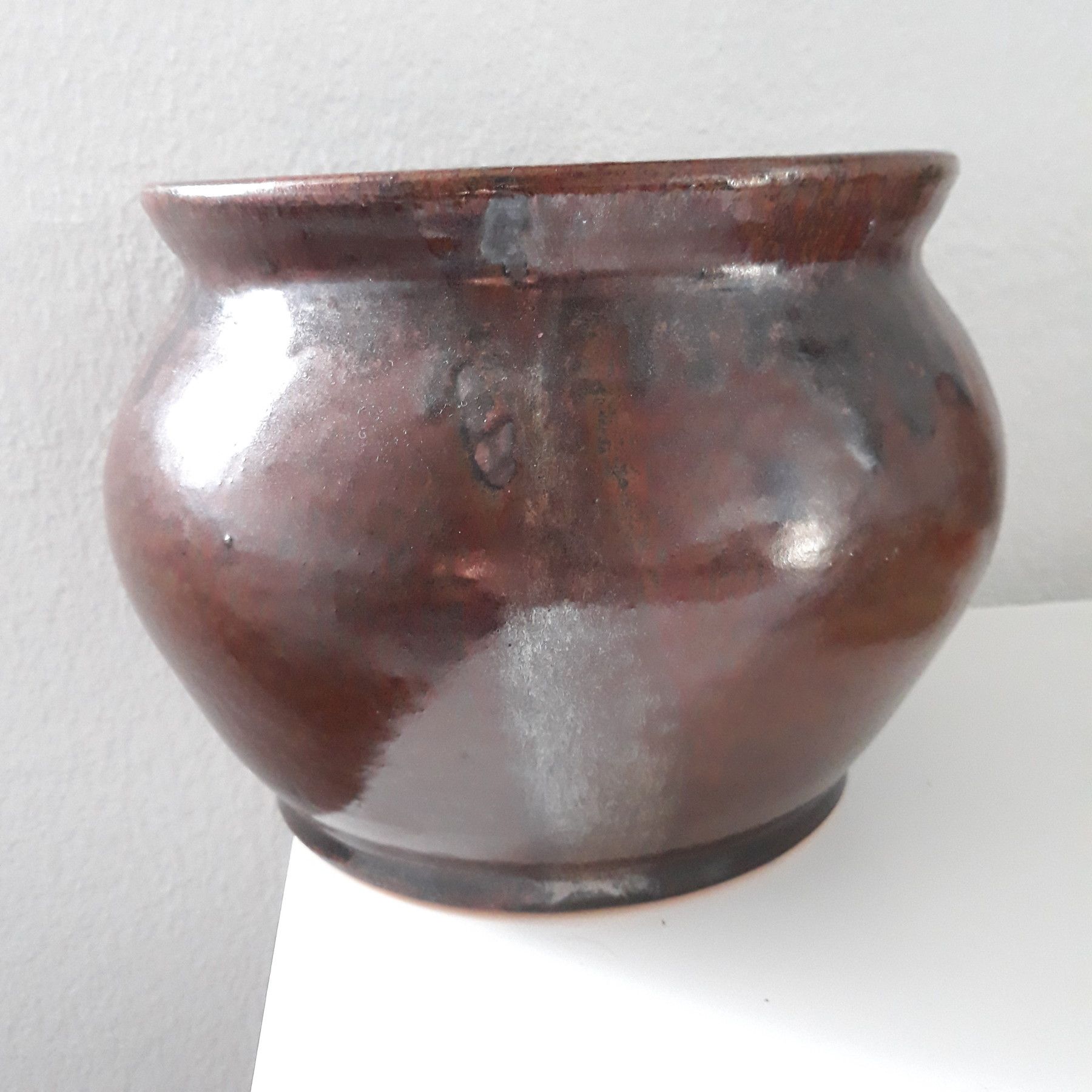 Pot de fleurs couleur rouille