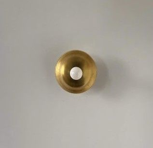 Applique ronde en laiton